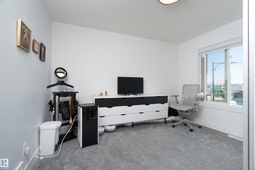 Room featuring light gray carpet flooring and white walls - 4714 Charles Bay Bay, Edmonton, AB 