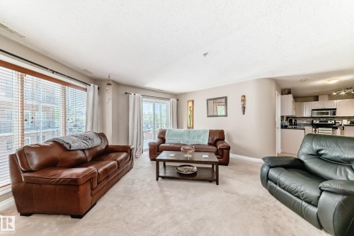 220 4312 139 Avenue, Edmonton, AB - Indoor Photo Showing Living Room