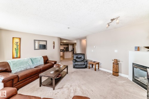 220 4312 139 Avenue, Edmonton, AB - Indoor Photo Showing Living Room With Fireplace