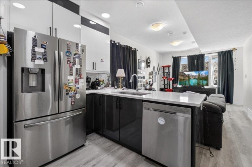 #1 11616 82 St Nw, Edmonton, AB - Indoor Photo Showing Kitchen With Double Sink