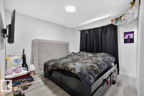#1 11616 82 St Nw, Edmonton, AB - Indoor Photo Showing Bedroom