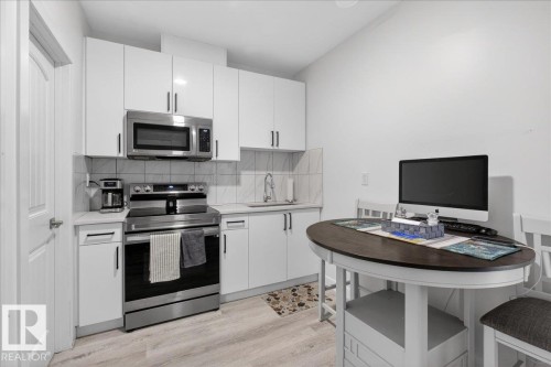 #1 11616 82 St Nw, Edmonton, AB - Indoor Photo Showing Other Room