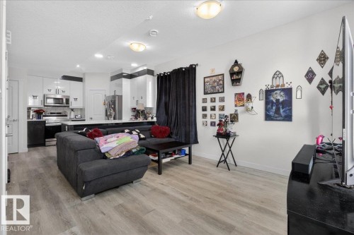 #1 11616 82 St Nw, Edmonton, AB - Indoor Photo Showing Living Room