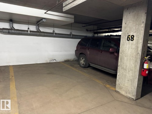 300 16715 100 Avenue, Edmonton, AB - Indoor Photo Showing Garage