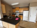 300 16715 100 Avenue, Edmonton, AB  - Indoor Photo Showing Kitchen With Double Sink 