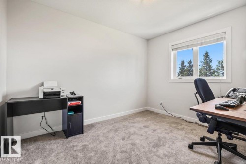 Carpeted room with a double-paned window - 125 Birchwood Close, Devon, AB 