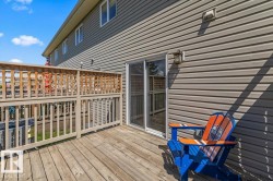 Expansive wood deck with a built-in lattice privacy screen - 