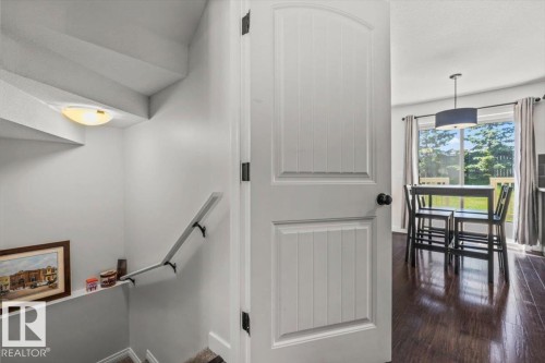 Interior white paneled door with matte black hardware - 125 Birchwood Close, Devon, AB 