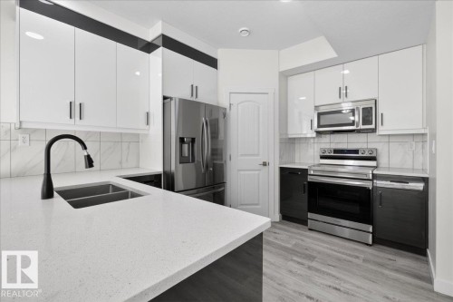 #2 11616 82 St Nw, Edmonton, AB - Indoor Photo Showing Kitchen With Double Sink With Upgraded Kitchen