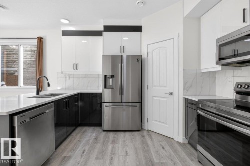 #2 11616 82 St Nw, Edmonton, AB - Indoor Photo Showing Kitchen With Double Sink With Upgraded Kitchen