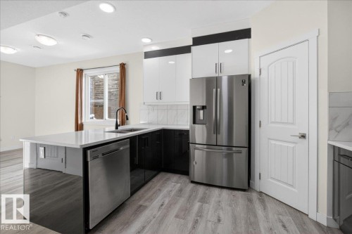 #2 11616 82 St Nw, Edmonton, AB - Indoor Photo Showing Kitchen With Double Sink