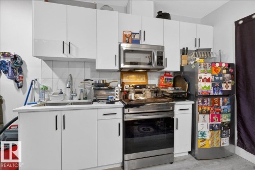#2 11616 82 St Nw, Edmonton, AB - Indoor Photo Showing Kitchen With Double Sink