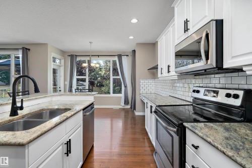13 Southfork Court, Leduc, AB - Indoor Photo Showing Kitchen With Double Sink With Upgraded Kitchen