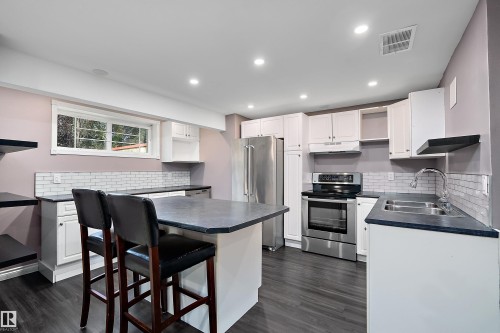 13 Southfork Court, Leduc, AB - Indoor Photo Showing Kitchen With Double Sink