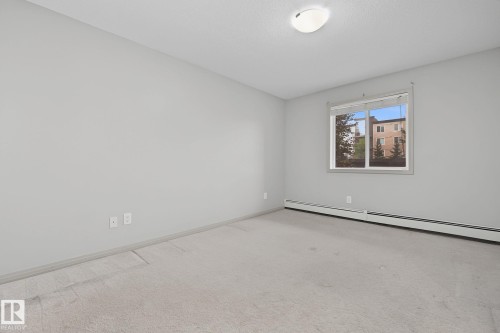 #111 5005 165 Av Nw, Edmonton, AB - Indoor Photo Showing Other Room
