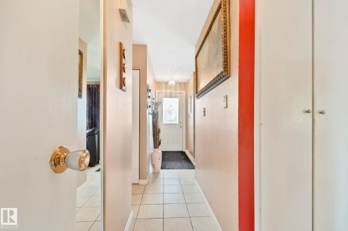 Entryway featuring square tile flooring extending to the front door - 30 Garden Valley Drive, Stony Plain, AB - Indoor Photo Showing Other Room