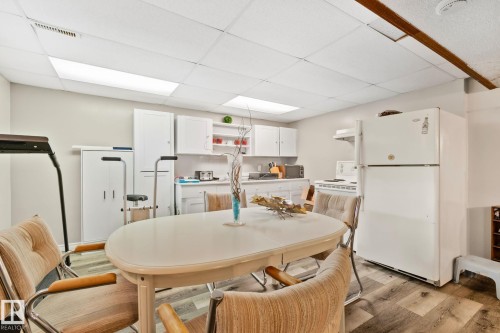 Lower-level living space featuring wood-finish flooring and recessed lighting - 30 Garden Valley Drive, Stony Plain, AB - Indoor