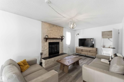 4335 53 Avenue, Tofield, AB - Indoor Photo Showing Living Room With Fireplace