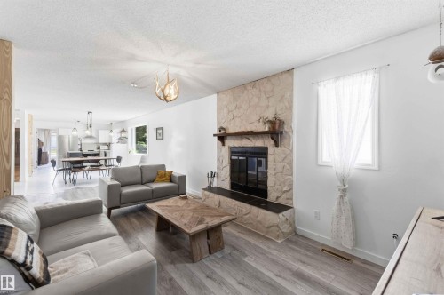 4335 53 Avenue, Tofield, AB - Indoor Photo Showing Living Room With Fireplace