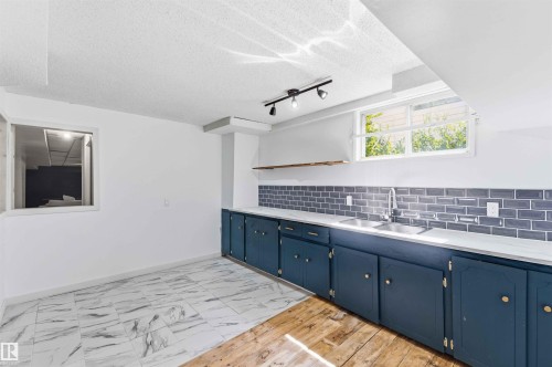 4335 53 Avenue, Tofield, AB - Indoor Photo Showing Kitchen With Double Sink