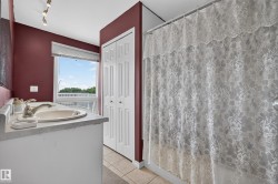 Bathroom vanity featuring an integrated sink with a dual-handle faucet - 