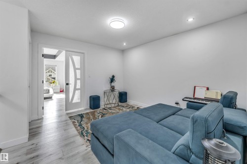 Neutral color palette throughout featuring recessed lighting and a flush-mount ceiling light - 5809 65 Street, Beaumont, AB - Indoor