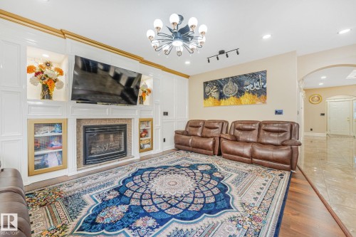 1511 68 Street Sw, Edmonton, AB - Indoor Photo Showing Living Room With Fireplace