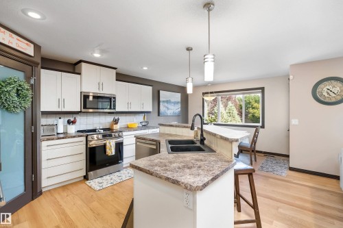 12 Henderson Bay, Spruce Grove, AB - Indoor Photo Showing Kitchen With Double Sink With Upgraded Kitchen