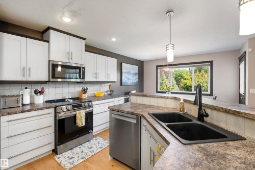 12 Henderson Bay, Spruce Grove, AB - Indoor Photo Showing Kitchen With Double Sink