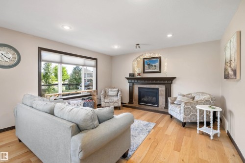 12 Henderson Bay, Spruce Grove, AB - Indoor Photo Showing Living Room With Fireplace