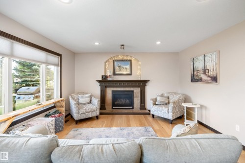 12 Henderson Bay, Spruce Grove, AB - Indoor Photo Showing Living Room With Fireplace