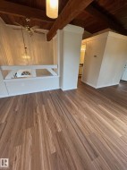Wood-finish flooring with varied grain patterns - 