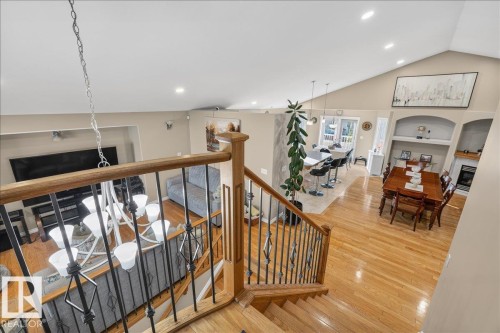 Hardwood flooring extends throughout this open-concept layout - 6050 164A Avenue, Edmonton, AB - Indoor Photo Showing Other Room