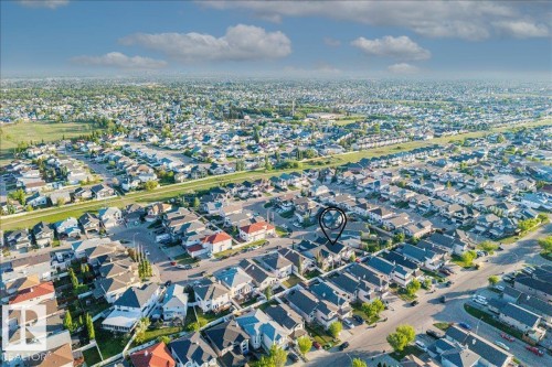 Residential neighborhood featuring a mix of detached homes and green spaces - 6050 164A Avenue, Edmonton, AB - Outdoor With View