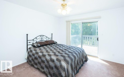Bright room with light-toned walls and carpet flooring - 25023 Twp Rd 612, Rural Westlock County, AB 