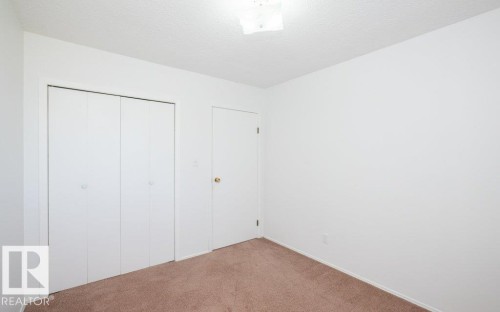 Neutral wall finishes with a textured ceiling - 25023 Twp Rd 612, Rural Westlock County, AB 