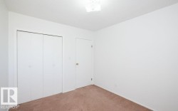 Neutral wall finishes with a textured ceiling - 