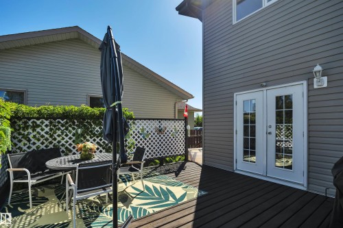 Spacious outdoor deck featuring dark wood-finish planking - 184 Garwood Cres, Wetaskiwin, AB - Outdoor With Deck Patio Veranda With Exterior