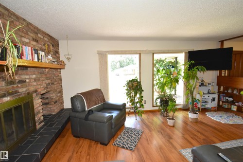 58 Wilson Crescent, Sherwood Park, AB - Indoor Photo Showing Living Room With Fireplace