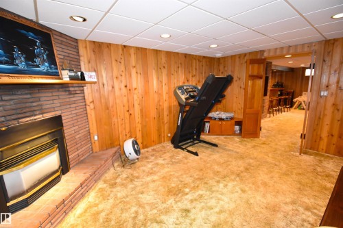 58 Wilson Crescent, Sherwood Park, AB - Indoor Photo Showing Other Room With Fireplace