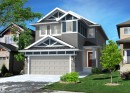 Two-story residence featuring a combination of siding and stone veneer, a prominent two-car garage, and a covered entry - 1729 Crossbill Loop N, Edmonton, AB 