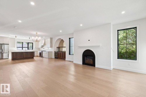 9023 90 Street, Edmonton, AB - Indoor Photo Showing Living Room With Fireplace