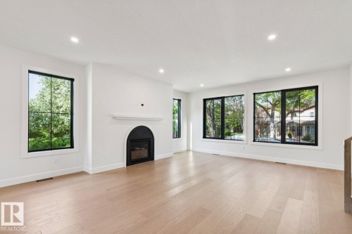 9023 90 Street, Edmonton, AB - Indoor Photo Showing Living Room With Fireplace