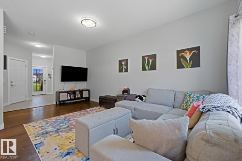 3302 66 Street, Beaumont, AB - Indoor Photo Showing Living Room