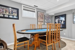 Recreation room featuring carpet flooring and recessed lighting - 