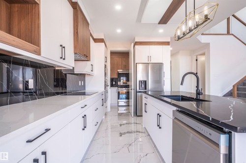 216 33 Street Sw, Edmonton, AB - Indoor Photo Showing Kitchen With Upgraded Kitchen