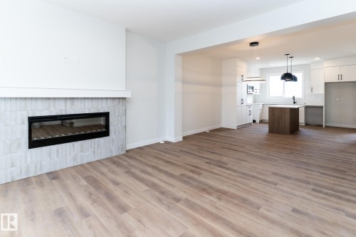 3319 Roy Brown Way Nw, Edmonton, AB - Indoor Photo Showing Living Room With Fireplace