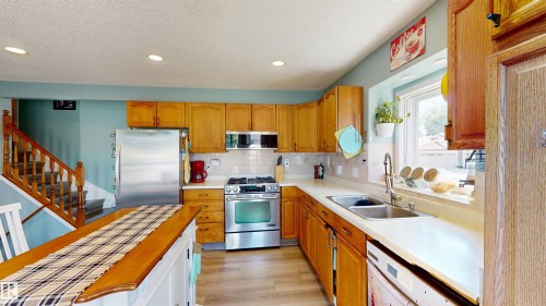 160 St. Andrews Drive, Stony Plain, AB - Indoor Photo Showing Kitchen With Stainless Steel Kitchen With Double Sink