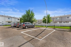 Dedicated parking space with white perimeter markings - 