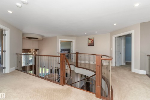 Spacious upper-level landing with plush carpeting and recessed lighting - 3503 Watson Point(E), Edmonton, AB 